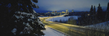 Winding Road Running through a Snow Covered Landscape, Anchorage, Alaska, USA