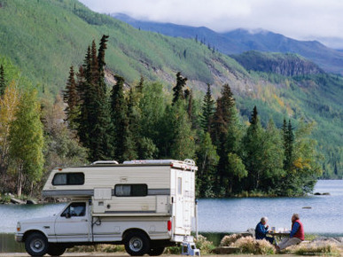 RV Camping Couple Stop for a Break on the Shores of Long Lake along the Glenn Highway, Alaska